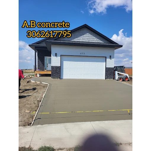 Broom-finish concrete driveway installed by AB Concrete Finishing in Saskatoon
